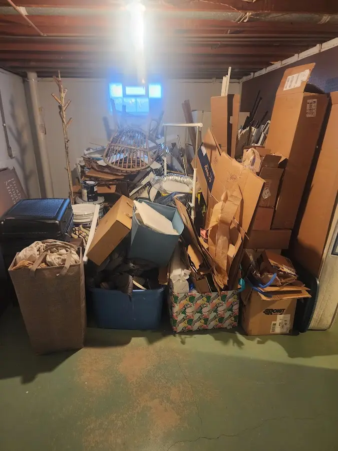 Roll-off dumpster container at job site for Yard Waste Dumpster Rental in Monitor